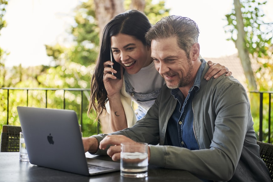 Managing Stress and Anxiety for Improved Mental Health couplelaptopoutside.jpg